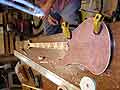 Greg helping with the binding on the fingerboard